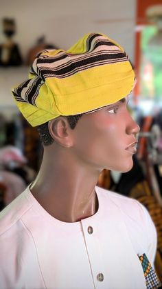 Discover the Elegance of African Heritage: Adebayo Aso Oke Fila Kufi Hat by Dupsie's African Fashion** Introducing the Adebayo Aso Oke Fila Kufi Hat, a masterpiece of African fashion, intricately handwoven with the finest threads in vibrant yellow and striking black stripes, exclusively by Dupsie's African Fashion. This African hat, a symbol of sophistication and cultural pride, seamlessly blends traditional Yoruba craftsmanship with contemporary style, making it a must-have accessory for both f Traditional Adjustable Yellow Hat, Nigerian Traditional Caps For Men, Nigerian Beaded Cap For Men, Yoruba Fila Cap, Traditional Adjustable Yellow Headwrap, African Dashiki Shirt, African Tops For Women, African Pants, African Shoes