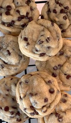 several chocolate chip cookies on a cooling rack