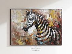 a painting of a zebra is hanging on the wall