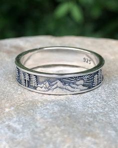 Sterling Silver Sun, Mountain and Trees Band| The Life Divine The perfect ring for lovers of the outdoors and nature. Ring Band measures just over 3/16" H Gifts For Nature Lovers Men, Rock Climbing Jewelry, Guys Rings Aesthetic, Granola Rings, Men’s Jewlery Silver, Men’s Silver Rings, Men With Rings, Male Jewelry Aesthetic, Men’s Accessories