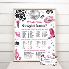 a sign that says what's your cowgirl name? with pink and black decorations