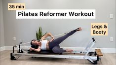 a woman is doing pilates on a rowing machine