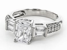 Pre-Owned Bella Luce ® white diamond simulant 3.85ctw rectangular octagon, baguette, and round, rhodium over sterling silver ring. Measures approximately 0.88"L x 0.31"W and is not sizeable. The diamond equivalent weight is 2.52ctw..  This product may be a customer return, vendor sample, or on-air display and is not in its originally manufactured condition.  It may not be new.  In some instances, these items are repackaged by JTV. Classic Jewelry With Baguette Diamonds In Rectangular Shape, Silver Rectangular Rings With Baguette Diamonds, Classic Rectangular Cubic Zirconia Jewelry, Silver Octagon Ring With Baguette Diamonds, Rectangular Diamond-cut Cubic Zirconia Jewelry, Rectangular Cubic Zirconia Jewelry With Diamond Accents, Silver Octagon Rings With Baguette Diamonds, Dazzling Rectangular Diamond Cut Jewelry, Platinum Octagon Baguette Diamond Jewelry