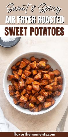 sweet and spicy air fryer roasted sweet potatoes in a white bowl with text overlay