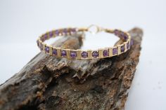 For the Amethyst lover. Whether it's your birthstone or you just love purple, this bracelet is certain to please. Made from 14kt Gold Filled material and natural 4mm Amethyst faceted gemstones. I also give you the option to have this bracelet made in 14kt Rose Gold fill or a Fine .935 Argentium Silver. Just choose your size and material option and I'll make this bracelet Just4u! Spiritual Amethyst Gold Bracelets, Purple Jewelry With Jubilee Bracelet For Anniversary, Purple Amethyst Birthstone Bracelet, Spiritual Purple Birthstone Bracelets, Gold Amethyst Beaded Bracelets, Gold Amethyst Gemstone Bracelets, Amethyst Bangle Bracelets For Anniversary, Stackable Amethyst Gold Jewelry, Amethyst Gemstone Bracelets For Anniversary