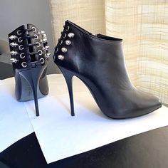 Guiseppe Zanotti Black Leather Ankle Boots. Size 36.5-6. 9.5" Long Inside Shoes Following Slope. 4.5" Heel Height. Edgy Silver-studded Heels For Party, Punk Style Party Heeled Boots With Reinforced Heel, Edgy Heeled Boots With Reinforced Heel For Evening, Punk Heeled Boots With Metal Feet For Parties, Edgy Evening Heeled Boots With Reinforced Heel, Punk Style Heeled Boots With Metal Feet For Parties, Punk Ankle Boot Heels For Night Out, Edgy High Heels With Silver Studs, Spiked Heeled Boots For Party