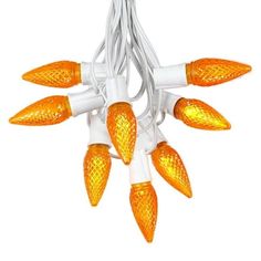 orange christmas lights on white wire