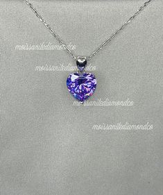 "A beautiful purple shaded necklace that is sure to get lots of attention. Makes a great gift, arrives in a wrapped gift box. Chain Size : 18 \" (45.7 cm) including the clasp Pendant Size : 1.2 cm (5 Carat) Main Stone Color : Purple Main Stone: Purple Sapphire Main Stone Shape : Heart Cut Metal : Real Solid 925 Sterling Silver Hallmark : 925 Stones Setting : Prong Finish : Fine Polished Guaranteed High Quality Purple Heart Sapphire Necklace 5 Carat Purple Sapphire Bridal Necklace 925 Sterling Si Purple Diamond Cut Sterling Silver Jewelry, Purple Sterling Silver Jewelry Diamond Cut, Purple Diamond Cut Jewelry For Wedding, Silver Heart Necklace With Brilliant Cut As A Gift, Purple Sterling Silver Diamond Cut Jewelry, Silver Heart Necklace With Brilliant Cut For Gift, Purple Cubic Zirconia Necklace For Formal Occasions, Purple Cubic Zirconia Jewelry For Gifts, Heart Cut Diamond Cut Necklace For Gift