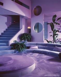 a living room filled with lots of purple furniture and plants next to a stair case