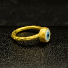 Blue Evil Eye Ring | Protection Gold Hammered Ring | 925 Sterling Silver Ring 24K Gold Plated | Good Luck Ring | Dainty Gift Handcrafted hammered  Silver RingOur shop offer free ring sizing and color options.(Oxidized(Black),Gold Plated)Metal : 925 Sterling SilverGemstone : Evil EyeBand Size : 2 mmRing Weight : 3.3 gramsRing Size : US 6 (The size you want is made for free).(We used the US standard sizing) **Custom Orders is Made**As pellada family, we will be happy to help you if you contact us Hand Forged Rings As Gift, Yellow Gold Evil Eye Rings As Gifts, Gold Evil Eye Promise Ring, Evil Eye Rings As Gifts, Gold Open Ring With Evil Eye Detail, Gold Open Ring With Evil Eye, Gold Rings With Evil Eye For Gift, Gold Evil Eye Ring As A Gift, Gold Evil Eye Ring Gift