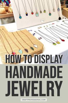 a display table with jewelry on it and the title how to display handmade jewelry