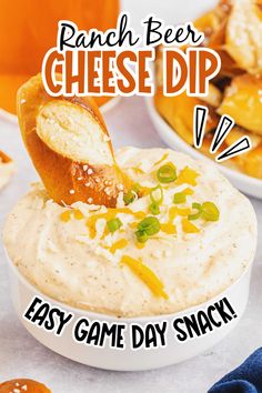 a bowl of ranch beer cheese dip with a spoon sticking out of it and the words easy game day snack