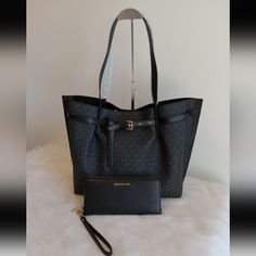 Nwt Emilia Michael Kors Tote Bag With Black Nwt Wristlet Michael Kors Emilia Large Logo Tote Bag Logo-Print Canvas Firm Price 74% Coated Canvas/19% Polyester/7% Polyurethane Trim: 60% Polyurethane/20% Cotton/20% Polyester Gold-Tone Hardware 16.75”W X 11.5” H X 8.5”D Handle Drop: 11.25” Interior Details: Back Zip Pocket, Center Zip Compartment, 6 Slip Pockets Lining: Polyester Snap/Zip Fastening Imported #Coach #Kate #Spade #Coach #Pink #Brown #White #Wallet #Satchel Nwt Black Pebbled Leather Jet Michael Kors Emilia Tote, Michael Kors Black Bag With Top Carry Handle, Michael Kors Black Shoulder Bag With Detachable Handle, Michael Kors Black Bag With Leather Handles, Michael Kors Black Shoulder Bag With Leather Handles, Michael Kors Black Tote Satchel, Michael Kors Black Bag With Zipper Closure, Michael Kors Tote Shoulder Bag With Zipper Closure, Michael Kors Tote Bag