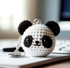 Dive into crochet with our panda Crochet PDF Pattern--perfect for all skill levels!  This PDF guide includes detailed instructions, lots of step-by-step photos, and a handy list of materials, so creating your panda will be a breeze! LANGUAGE: The pattern is available only in English (US). size - about 2 inches (5 cm) MATERIALS: * Yarn - 2 colors. * Safety eyes (8mm) * Crochet hook (1.75 mm). * Fiber fill stuffing * Needle for sewing * Scissors * Yarn needle * Stitch markers * Glue HOW DIGITAL DO Panda Keychain Crochet, Crochet Panda Keychain, Keychain Crochet Pattern, Panda Keychain, Panda Craft, Panda Head, Mini Amigurumi, Keychain Crochet, Animal Crochet