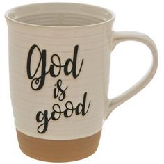 a coffee mug with the words god and good on it's side, sitting in front of a white background