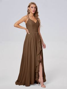 a woman wearing a long brown dress