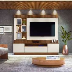 a living room with a large flat screen tv mounted to the side of a wall