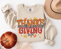 Custom Family Name Thanksgiving Matching Sweatshirt Thanksgiving Dinner Sweatshirt Pumpkin Family Sweatshirt Thanksgiving Group Sweatshirt Great item for that special someone or for yourself! Please contact me below if you have any questions! Details: Shirt (Bella Canvas 3001) -  - 100% cotton (fiber content may vary for different colors) - Medium fabric  - Classic fit - Tear-away label - Runs true to size Sweater (Gildan 18000)-  - 50% cotton, 50% polyester - Medium-heavy fabric (8.0 oz/yd² (271.25 g/m - Loose fit - Sewn-in label - Runs true to size - Sewn-in label - Runs true to size Family Matching Thanksgiving Shirt, Pumpkin Family, Thanksgiving Sweater, Matching Sweatshirts, Custom Ideas, Work Ideas, Thanksgiving Dinner, Family Name, Sew-in Labels