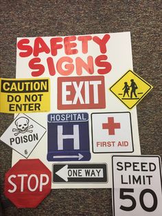 various safety signs and stickers on the floor