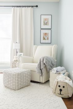 a white chair and ottoman in a room