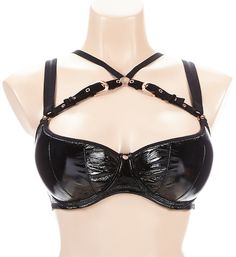 Unleash your inner dominatrix in this super sexy underwire bra. Vegan leather stretches over lightly padded half cups and center panel. Removable velvet band is adjustable. Multipart, underwire half cup has light padding and vertical seams to shape and support your breasts. Cups and center panel are sexy, vegan leather. Narrow, arched center panel has rose goldtone metal pendant. Revealing neckline has bound edges. Elastic underband provides extra stability and support. Tall, seamed sides and ba Party Push-up Bra With Adjustable Straps, Fitted Bra With Padded Cups For Night Out, Fitted Push-up Bra With Straps, Fitted Padded Bra For Night Out, Padded Bra For Night Out, Black Bra For Club, Fitted Strappy Bra With Padded Cups, Fitted Underwire Bra With Straps, Push-up Bra With Padded Cups For Night Out