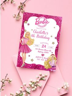 a pink birthday card with a barbie doll on the front and stars in the back