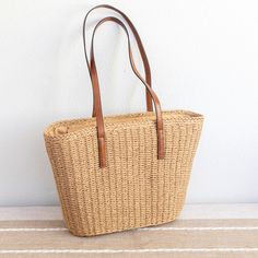 IN STOCK FAST SHIPPING FROM LOS ANGELES Large fashion straw woven tote bag perfect for all occasions. Its timeless design makes it the perfect everyday accessory, providing a fashionable and luxurious touch to any ensemble. Size: 44cm wide x 28cm tall (17in x 11in) Designer Style ID: 8498 Country Style Straw Woven Tote Bag, Vintage Vibes, Summer Bag, Everyday Shoulder Bag, Beach Bag Straw Weaving, Woven Tote Bag, Market Tote, Jute Bags, Everyday Accessories, Large Fashion, Shoulder Purse, White Bag, Casual Bags