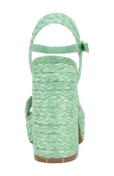 Head off to paradise in this sky-high sandal flaunting goldtone hardware and an expertly woven upper for beachy vibes. 4" heel; 1" platform Cushioned footbed Synthetic upper and lining/rubber sole Imported Summer Platform Heels With Straw Material, Straw Platform Heels For The Beach, Woven Block Heel Sandals For Summer, Spring Green Sandals With Woven Sole, Summer Woven Sandals With Block Heel, Straw Heels With Heel Strap For Vacation, Summer Woven Block Heel Sandals, Synthetic Heels For Vacation, Beach Straw Heels