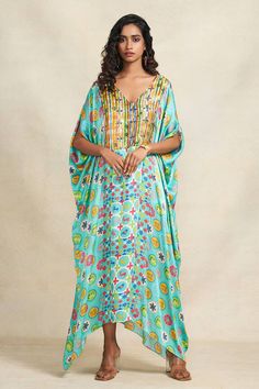 Turquoise kaftan featuring animal, abstract floral and geometric prints along with sequin embroidered bodice. - Aza Fashions Multicolor Sequined Dress For Navratri, Bohemian Sequin Kaftan For Festivals, Bohemian Festival Kaftan With Sequins, Festive V-neck Kaftan For Festival, Blue Printed Kaftan For Summer, Blue Kaftan With Printed Motifs For Summer, Blue Festive Kaftan For Vacation, Blue Kaftan For Spring Festive Occasions, V-neck Printed Kaftan For Summer