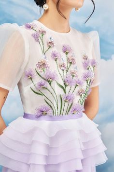 The dress with purple color combines a white color scheme and gentle, feminine floral embroidery patterns that will make you stand out in the crowd. Note:*Processing time takes 5-7 working days (NOT including shipping time).**The product can be customized according to measurements (bust,waist,hip) with an extra fee of 25% of the product value. Please contact support@meanblvd.com or send us a direct message on our fanpage for further assistance. Product Details - Product type: Midi Dress- Materia Patterns Outfit, Chifon Dress, Gown Dress Design, Organza Midi Dress, Gentle Feminine, Pattern Outfits, Floral Ruffle Dress, Floral Embroidery Patterns, Pola Sulam