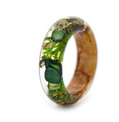 Аbsolutely natural ring by VyTvir are made with great love.  Materials: Malachite, Moss, birch tree and lichen , 24K Gold. Malachite is considered a symbol of wealth and prosperity, is an unusually beautiful stone that fulfills wishes. Birch is a tree symbolizing spring and resurrection, the month of April. Custom orders are welcome. Every item comes in a beautiful, individual original box ready for gift giving. Natural VyTvir rings are made with great love for nature If you have any questions p Nature-inspired Gift Rings, Nature-inspired Green Flower Ring As A Gift, Nature-inspired Green Flower Ring For Gift, Handmade Green Flower Ring, Nature-inspired Green Flower Ring As Gift, Unique Green Jewelry For Promise, Unique Green Promise Ring, Nature-inspired Rings With Natural Inclusions For Promise, Nature-inspired Green Jewelry For Promise