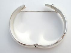 Vintage Jewelry - This is a high polished sterling silver hinged bangle bracelet. It is hallmarked 925, slightly over .5" wide, inside circumference 7" and weighs 20.7 grams. The bracelet shows a lot of reflection in the pictures. Silver Bangle Bracelet, Sterling Silver Bangle Bracelets, Sterling Silver Bangle, Silver Bangle Bracelets, Sterling Silver Bangles, Silver Bangle, Hinged Bangle, Silver Bangles, Bangle Bracelet