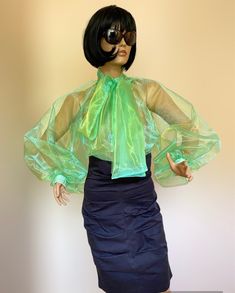 "This is a very stylish Womens Organza blouse. It is comfortable and cozy.  Made for a free flowing fit. Absolutelly transparent.  Great for all year around and for any special occasion or casual day can be dressed up or dressed down. SIZE CHART SIZE S - US 6, UK 8, EU 36 bust: bust around 34.5\"/90cm Waist: waist around 27.5\"/70cm Hips: hips around 34.5\"/90cm SIZE M - US 8, UK 10, EU 38 bust: bust around 37.5\"/95cm Waist: waist around 29.5\"/75cm Hips: hips around 37.5\"/95cm SIZE L - US 10, Fitted Green Organza Blouse, Stretch Puff Sleeve Evening Blouse, Evening Puff Sleeve Stretch Blouse, Stretch Puff Sleeve Blouse For Evening, Stretch Evening Blouse With Puff Sleeves, Sheer Puff Sleeve Blouse For Night Out, Green Summer Blouse For The Office, Chic Balloon Sleeve Blouse For Party, Puff Sleeve Blouse With Sheer Sleeves For Night Out