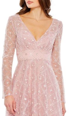 Rose pink embellished long sleeve a-line midi dress with v-neckline. Pink V-neck Sequin Evening Dress, Pink Long Sleeve Mother Of The Bride Dress, Spring Embellished V-neck Mother Of The Bride Dress, Fitted Bodice Long Sleeve Dress For Wedding Guest, Long Sleeve Evening Dress For Spring Gala, Long Sleeve Embellished Pink Dress, Long Sleeve Dress With Fitted Bodice For Wedding Guest, Pink Long Sleeve Embellished Dress, Spring Gala V-neck Mother Of The Bride Dress