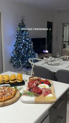 Hosting friendmas is always fun 🎄✨ #fyp #friendmas #christmas Friends Christmas Party Theme, Friendsmas Party Ideas Gift Exchange, Friendmas Aesthetic, Holiday Friends Party, Friendsgivmas Ideas, Apartment Christmas Party, Friend Holiday Party Ideas, Friendmas Dinner Table, Friend Xmas Party