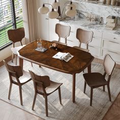 a dining room table with chairs around it