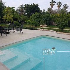 A beautiful garden with a swimming pool in its center. Private Pool, Stone