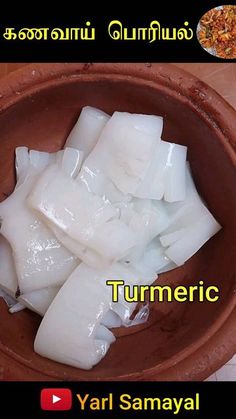 a bowl filled with chunks of food on top of a wooden table next to an advertisement for turmeric