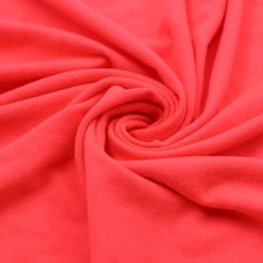 a close up view of a red fabric