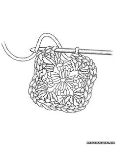 a crocheted bag hanging from a hook