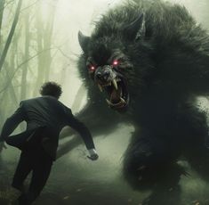 a man standing next to a giant monster in the woods