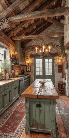 a rustic kitchen with an island in the middle