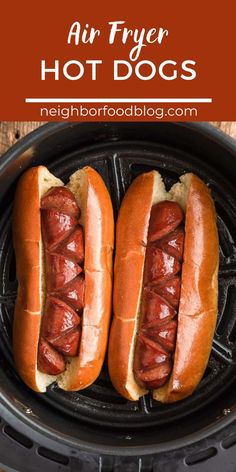 two hot dogs on buns in an air fryer with text overlay that reads, air fryer hot dogs