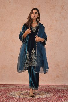 PRODUCT DETAIL:  Immerse yourself in the tranquil elegance of our Teal Blue Velvet Embroidered Suit. The rich This outfit is a perfect balance of simplicity and beauty, making it an ideal choice for various occasions where you want to make a statement with understated grace. Elevate your style effortlessly with this se Blue Sharara With Intricate Embroidery For Formal Occasions, Elegant Blue Palazzo Set With Dabka, Blue Straight Kurta Set With Intricate Embroidery, Fitted Blue Palazzo Set With Intricate Embroidery, Blue Fitted Palazzo Set With Intricate Embroidery, Elegant Blue Palazzo Set With Dabka Details, Elegant Blue Palazzo Set With Straight Kurta, Elegant Blue Saree Set, Elegant Blue Embroidered Sharara