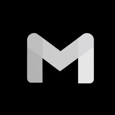 the letter m is made up of white paper