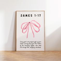 a pink poster with the words james 11 17 on it in front of a white wall