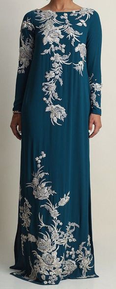 Teal always being a classic once again stands out in the crowd. This georgette kaftan is stare worthy. The hues of ivory resham, cutdana, sequin and bead work is placed carefully forming a soothing eye movement on side front and sleeves Shirt Length 58 to 60 inches Color: Teal Fabric: Gerogette Floor-length Floral Embroidered Kaftan For Evening, Floor-length Floral Embroidery Kaftan For Evening, Sequin Georgette Kaftan For Wedding, Elegant Floor-length Georgette Kaftan, Elegant Georgette Kaftan For Eid, Elegant Floral Embroidered Kaftan For Evening, Elegant Floral Embroidered Evening Kaftan, Elegant Sequined Kaftan For Eid, Elegant Floral Embroidery Kaftan For Evening