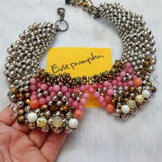 Received As Gift. Never Worn. Please Refer To Detailed Pictures And Video. No Missing Beads But Please Know That This Necklace Is Handmade. The Metal Beads Are Shiny And The Colored Beads Have Individual Variations. Adjustable Extender. *I Hate Scammers.I Will Videotape And Take Detailed Pictures That Are Dated Before Shipping. All My Items Are Packed Carefully And Please Do Not Ask For Transactions Outside Poshmark. Protech Yourself And Respect The Poshmark Community By Knowing Your Size And Yo Silver Beaded Necklaces With Jewels, Festive Silver Beaded Metal Necklace, Silver Beaded Necklaces With Colorful Beads For Costume Jewelry, Silver Beaded Necklaces With Colorful Beads As Costume Jewelry, Costume Jewelry Silver Beaded Necklaces With Colorful Beads, Silver Beaded Necklace With Colorful Beads For Costumes, Silver Costume Jewelry Beaded Necklaces With Colorful Beads, Silver Beaded Chain Necklace For Festive Occasions, Festive Silver Beaded Necklace With Colorful Beads