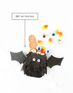 a bat craft with candy and candies on it