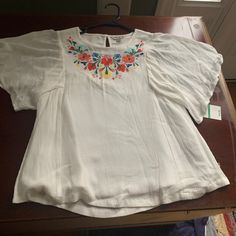 Girls Large - Lucky Brand Paid $39 - New With Tags Beautiful Embroidery At The Top. Cute Floral Embroidery Summer Tops, Cute Embroidered Summer Tops, Cute Embroidered Tops For Spring, Cute Multicolor Cotton Blouse, Cute Embroidered Spring Tops, Cute White Blouse With Floral Embroidery, Cute White Tops With Floral Embroidery, Cute Multicolor Embroidered Tops, Cute Cotton Tops With Floral Embroidery